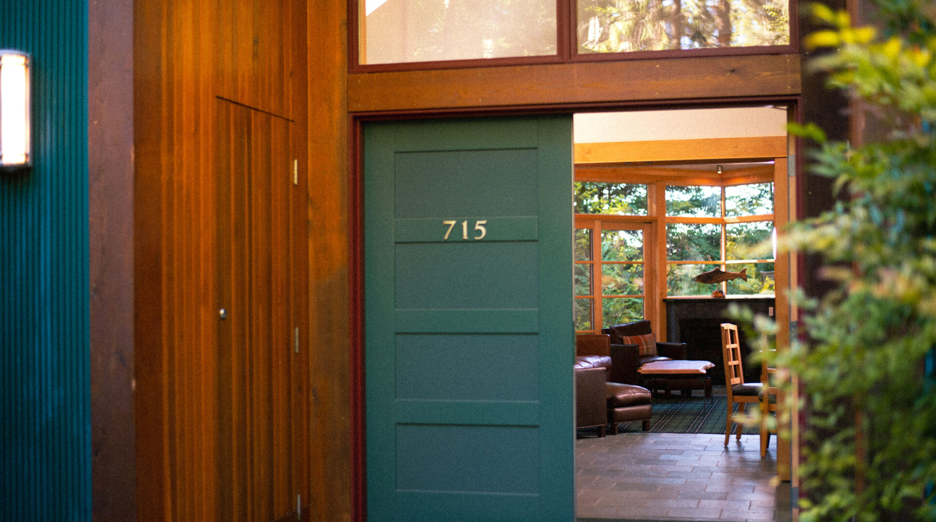 An open doorway to a Grove cabin